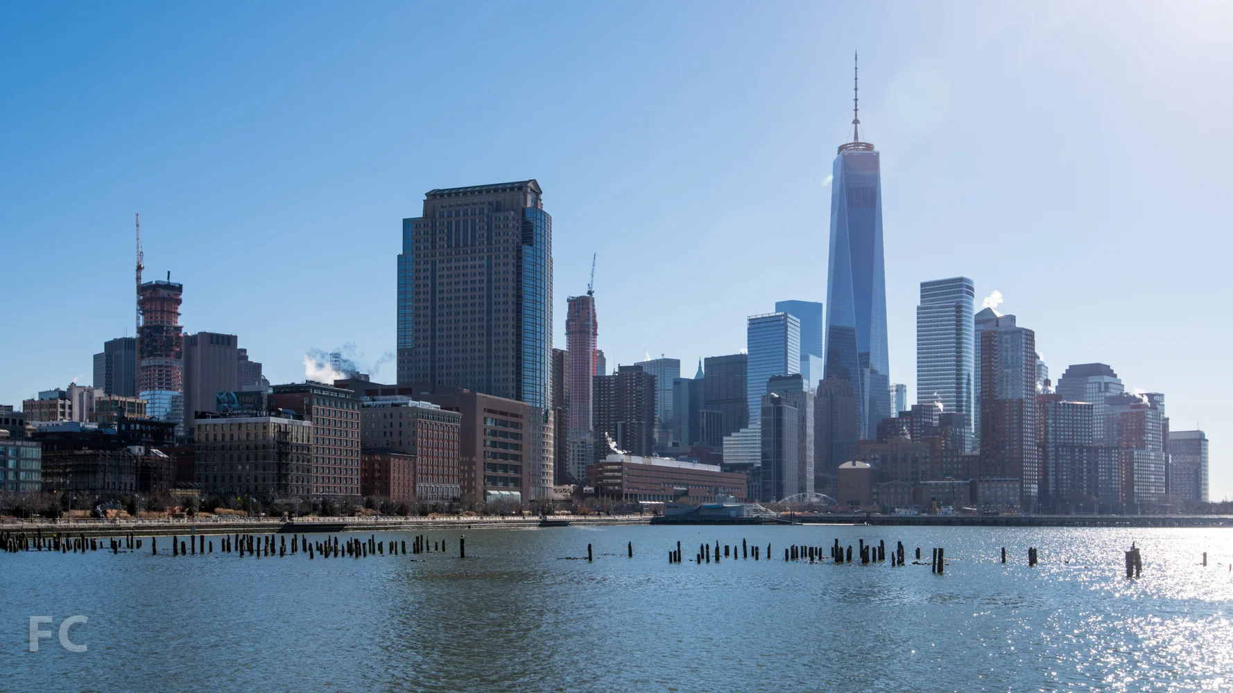 Lower Manhattan skyline with 56 Leonard (left), 30 Park Place (center), and One World Trade Center (right) from Pier 34.