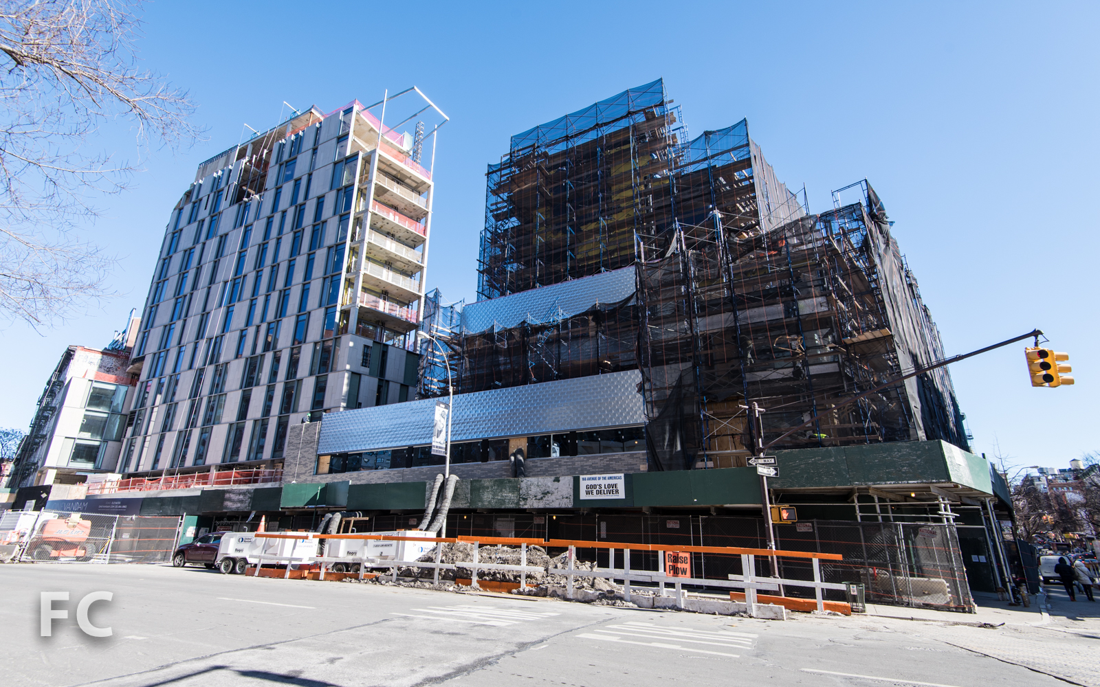 West facade of 166 Avenue of the Americas (right) and One Vandam (left)..