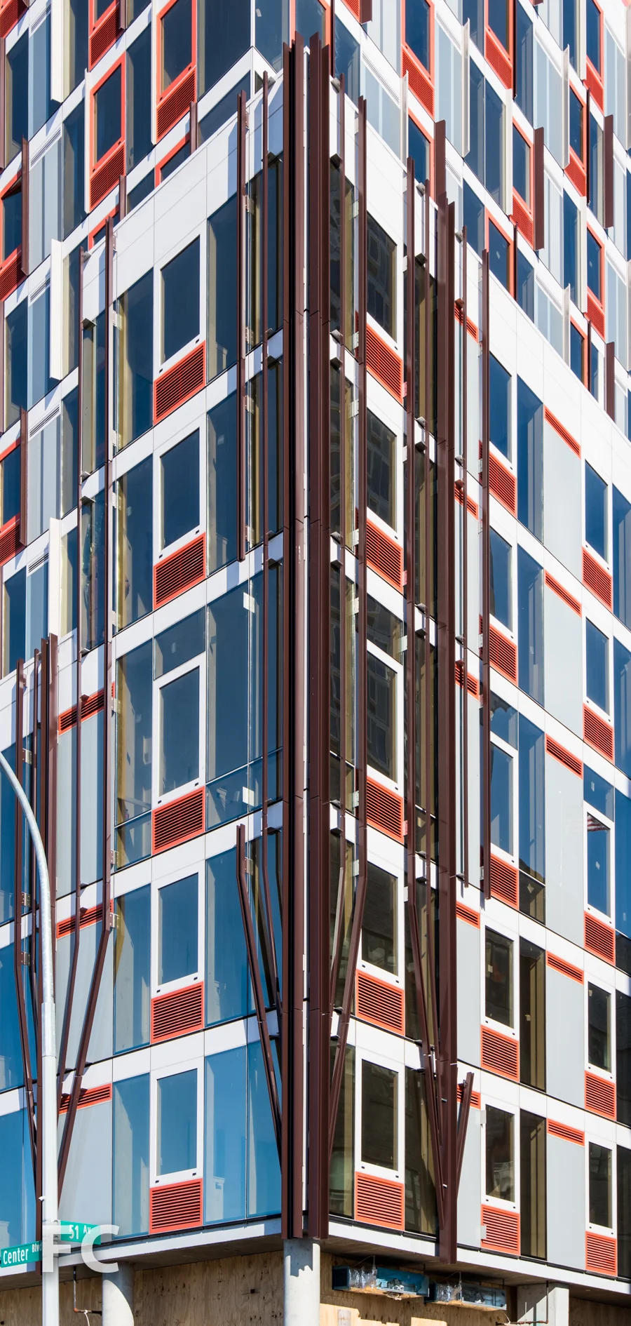 Facade detail on Building Hunter's Point South Commons's southwest corner.