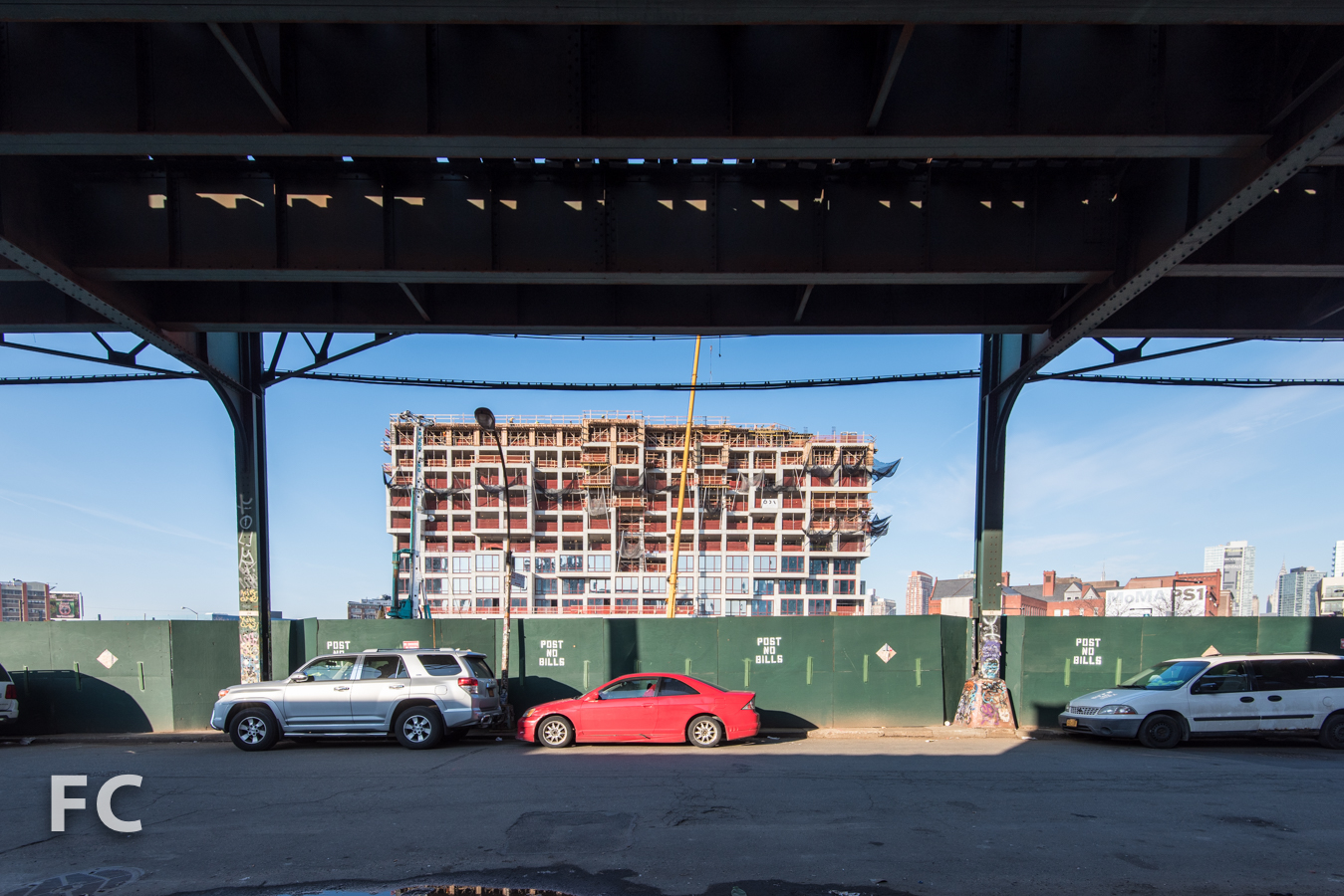 East facade (background) and the former 5 Pointz site (foreground) from Davis Street.