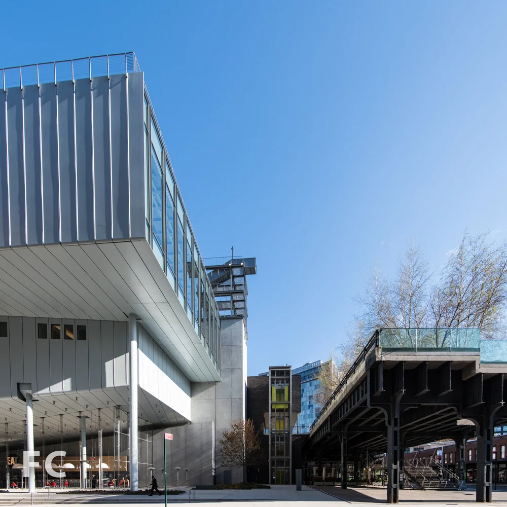 Southeast corner of the Whitney (left) and the southern entrance to the High Line (right).