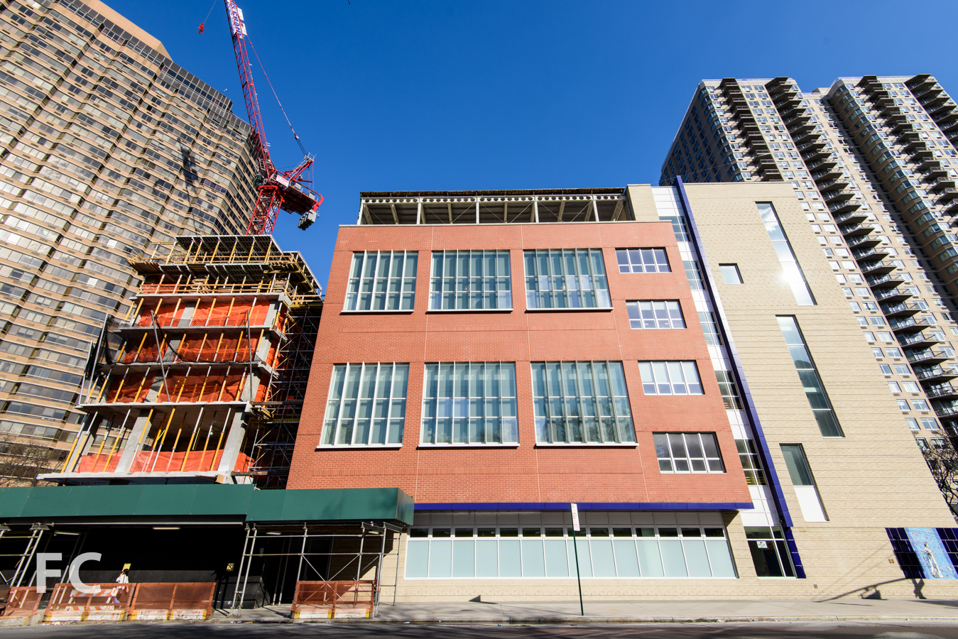 West facade of P.S. 281 (right) and the northwest tower (left).