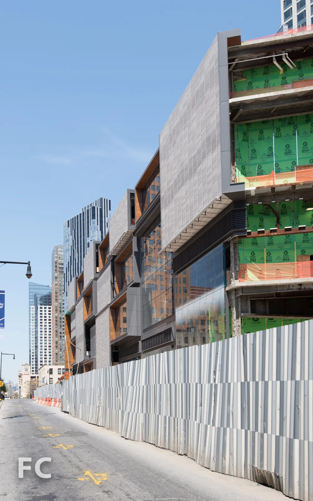 West facade of the Phase Two retail podium from Albee Square West.