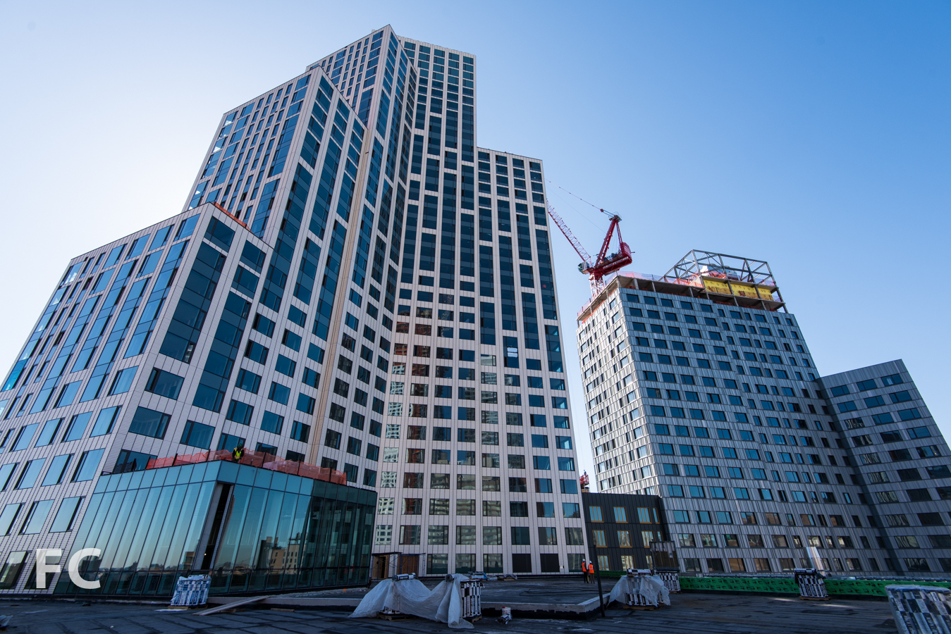 The west facade of the market rate (left) and affordable (right) towers from the amenity roof deck.