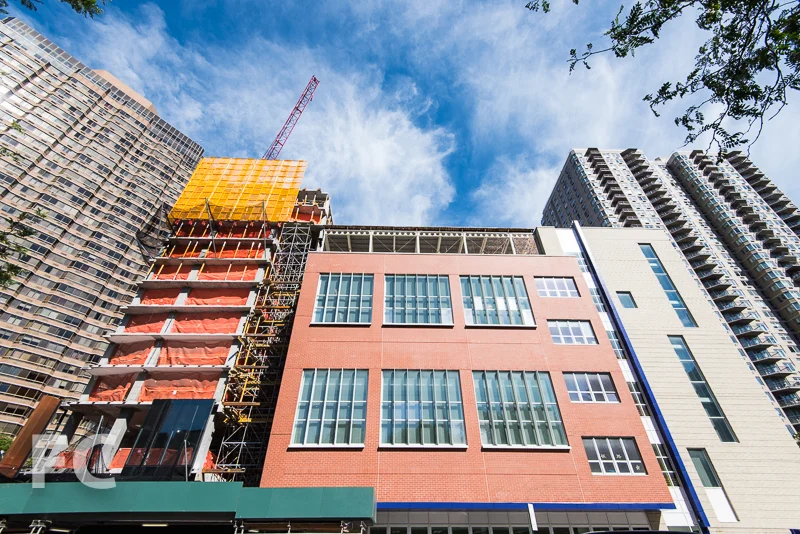 West facade of P.S. 281 (right) and the northwest tower (left).
