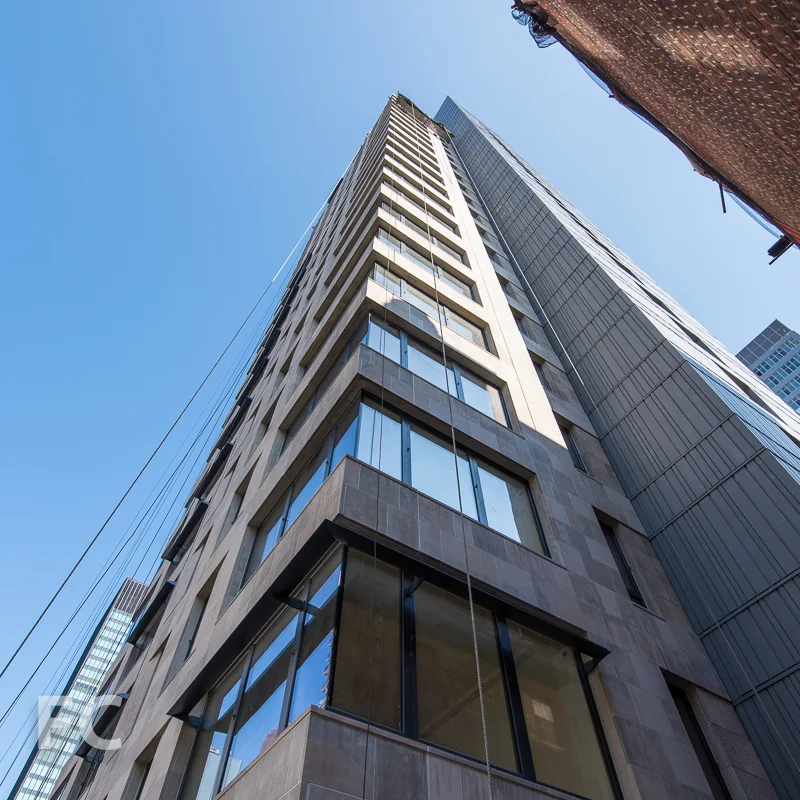 Southeast corner of the tower with an exterior fin installed on the lowest floor.
