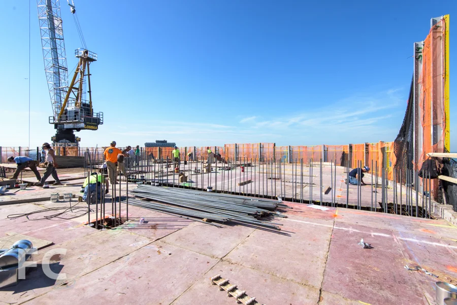 Workers prepare the 50th floor slab for the concrete pour.
