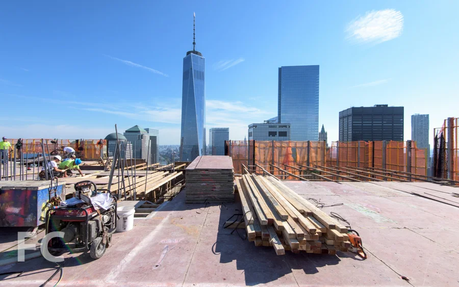 Workers prepare the 50th floor slab for the concrete pour.