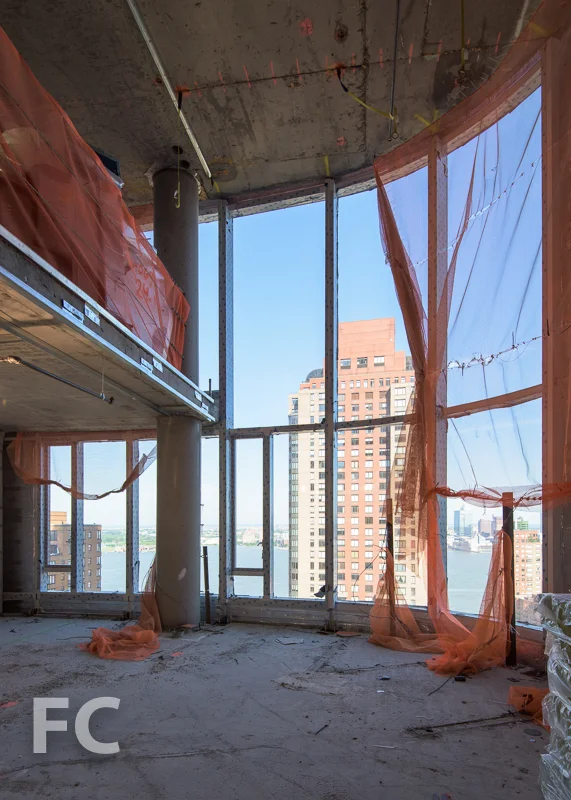 The double height living space of a duplex unit .