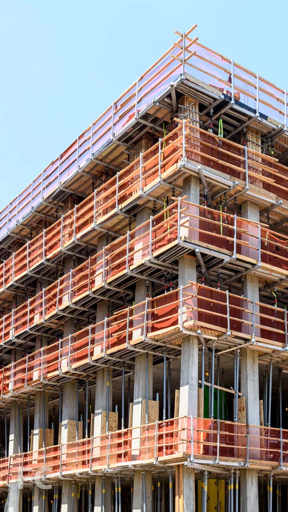 Closeup of the sloping, cast-in-place concrete columns