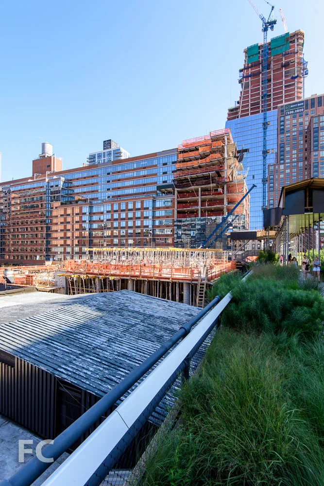 Southeast corner from the High Line with 507 W 28 (right) and 30 Hudson Yards (far right) under construction in the background.