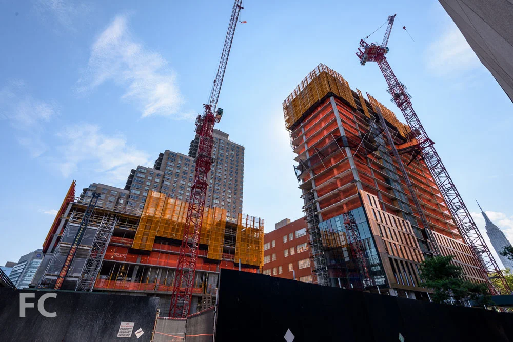 Northeast corner of the site from East 36th Street with the north (right) and south (left) towers.