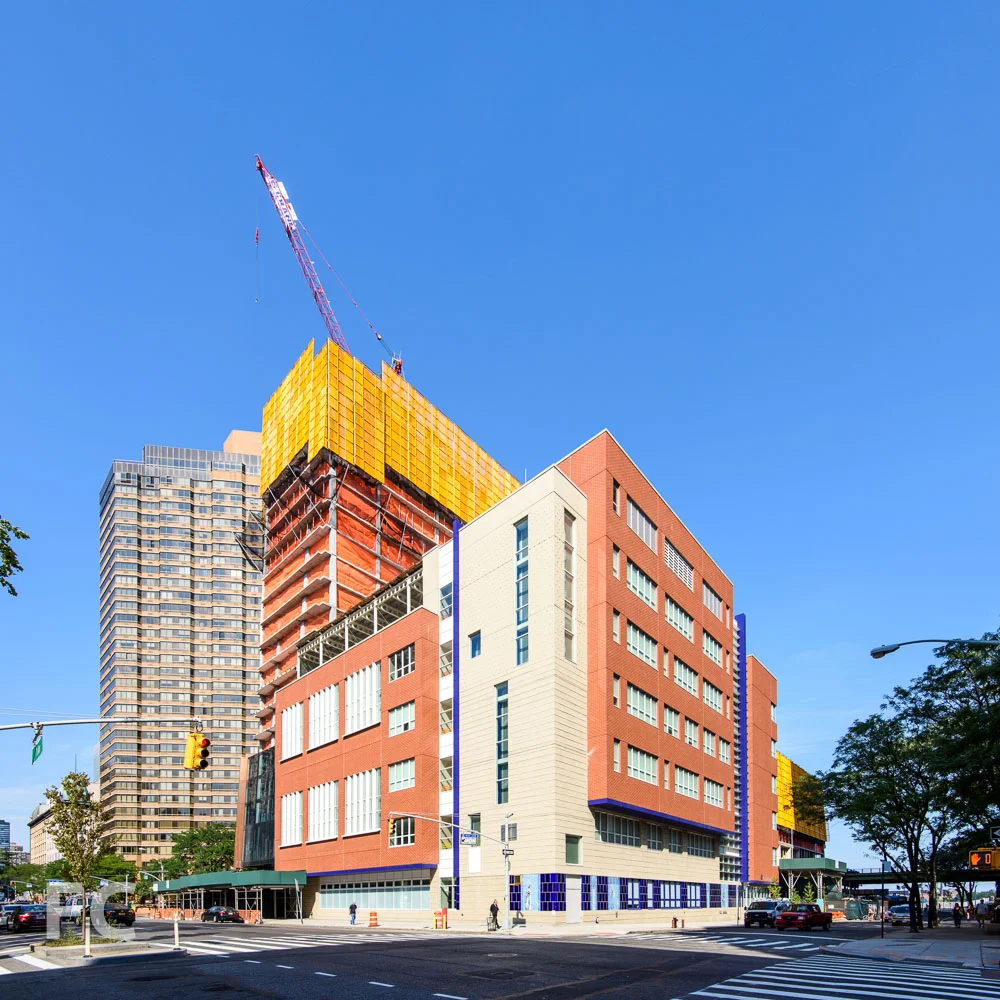 Southwest corner of the site with the north tower (left), south tower (right), and PS 281 (center).