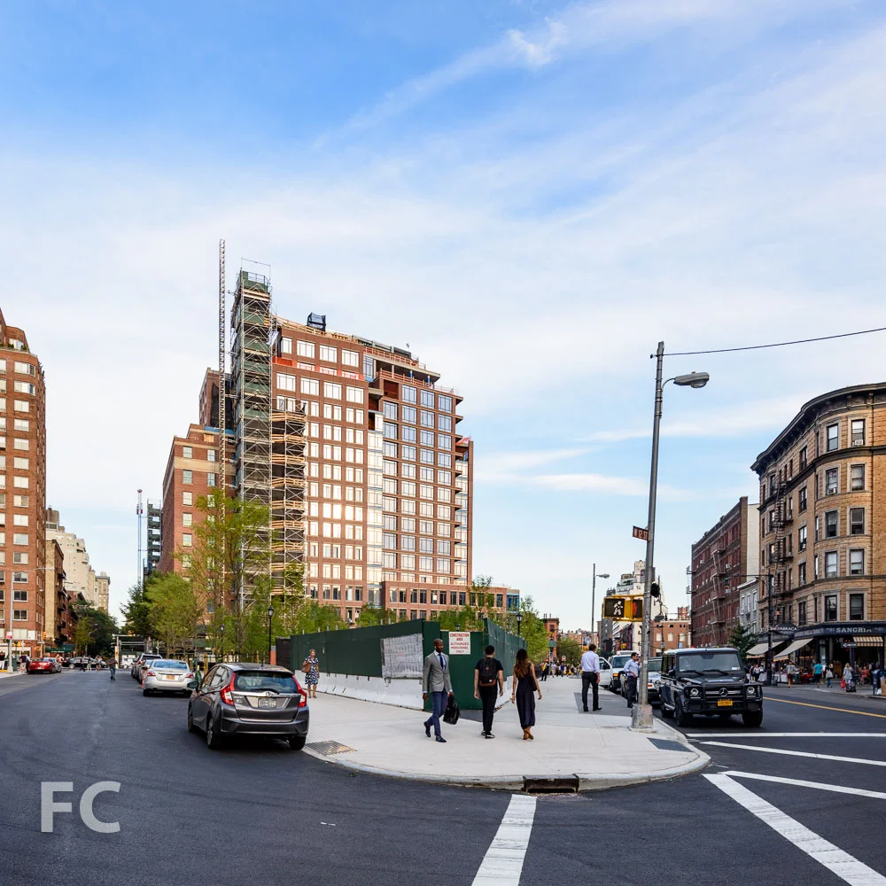 West façade from Greenwich Avenue with the new West Village Park in the foreground.