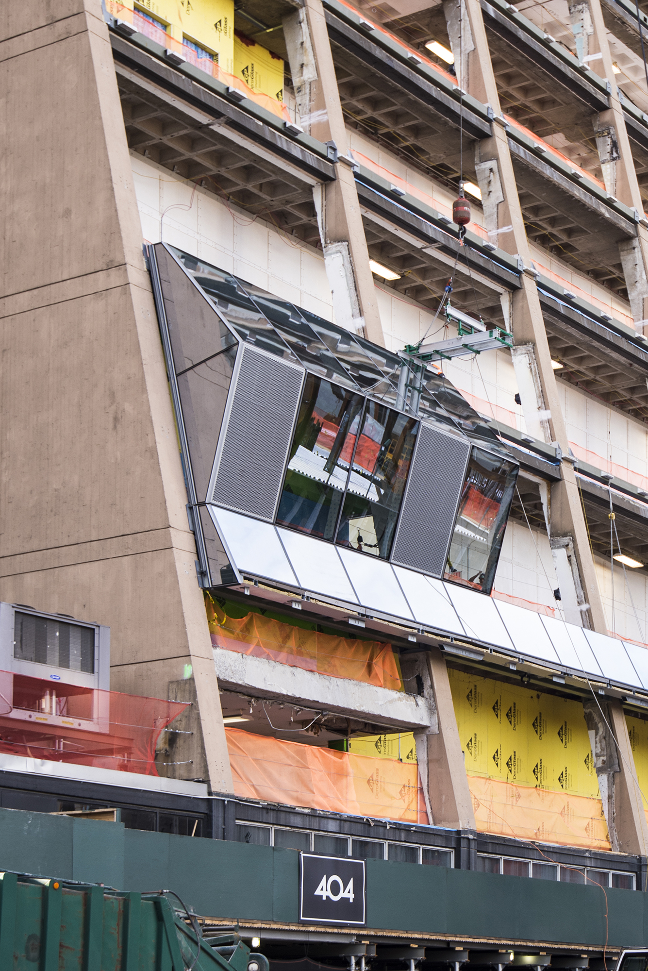 Detail of the curtain wall panels going up.