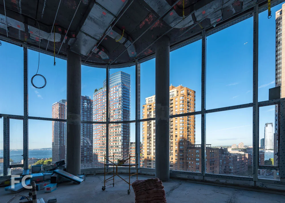 The double height living space of a southwest facing duplex unit.