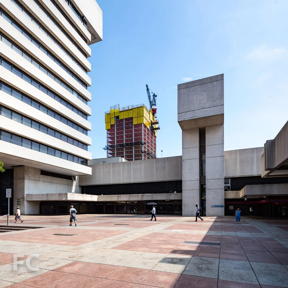 Southwest corner of the phase one tower from the Journal Square PATH station plaza.