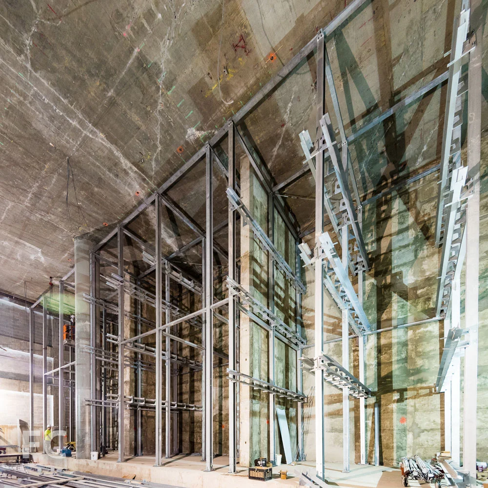 The automated parking system under construction in the basement.