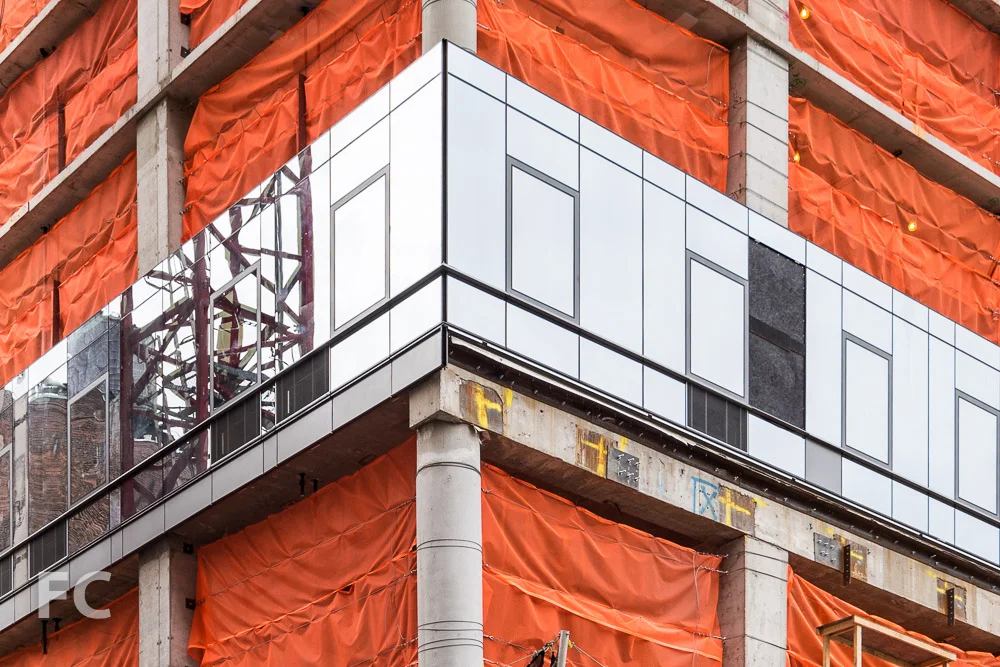 Curtain wall detail at the southwest corner of 401 West 31st Street.