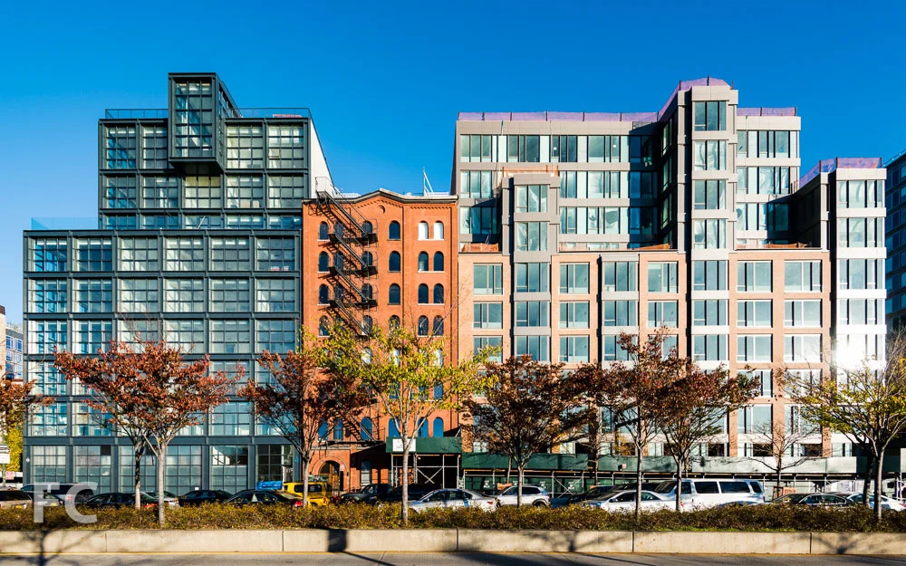 West facade of 290 West Street (left) and 460 Washington Street (right) from the Hudson River Greenway.