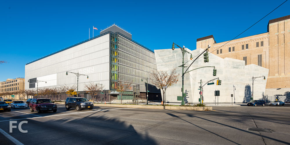 Looking north on West Street towards the Manhattan Districts 1/2/5 Garage (left) and the Salt Shed (right).