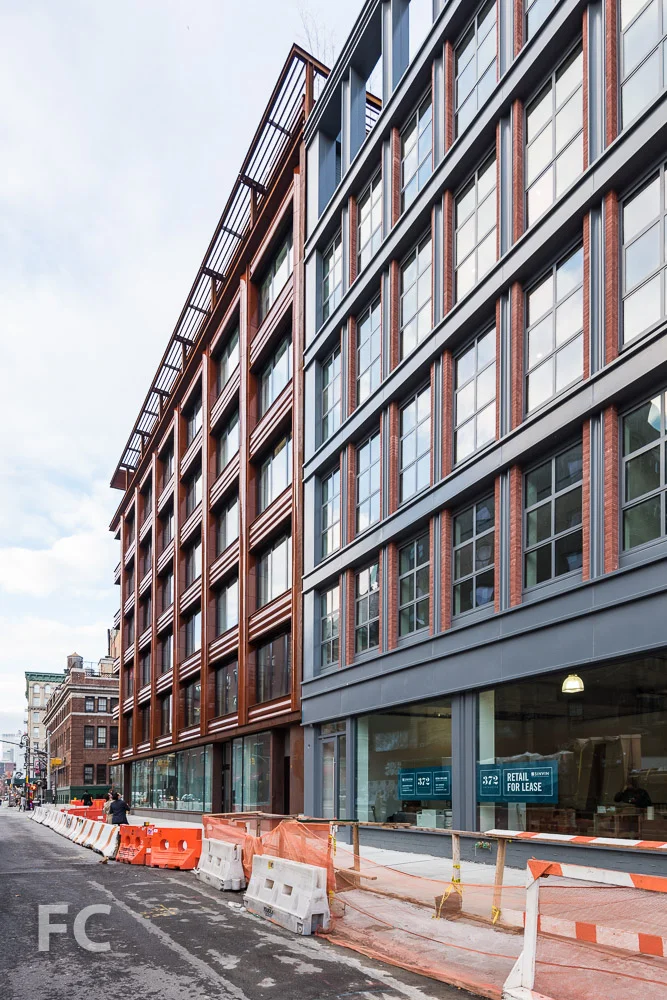 Ground floor retail at 10 Bond (left) and 372 Lafayette (right) along Lafayette Street.