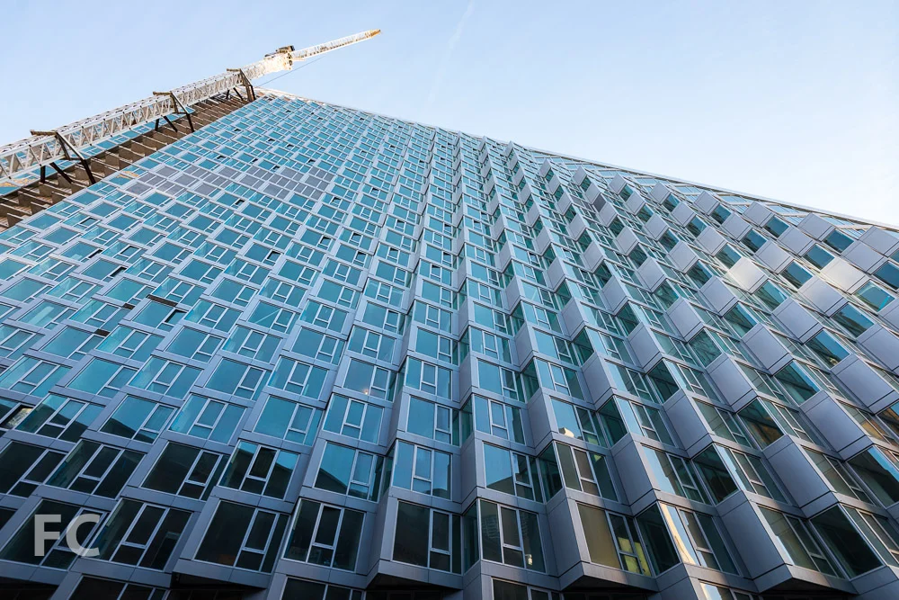Looking up at the north façade from West 58th Street.