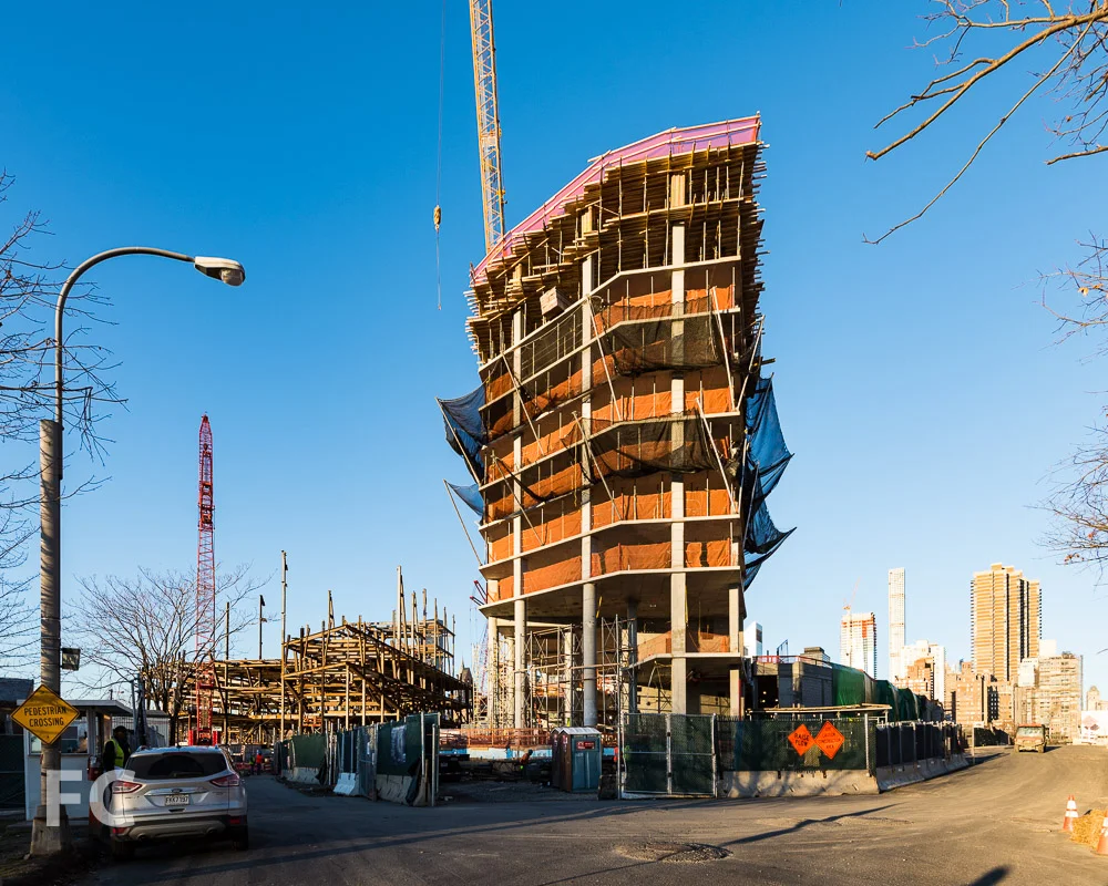 Northeast corner of the Residential Building (right) and The Bridge at Cornell Tech (left) from North Loop Road.