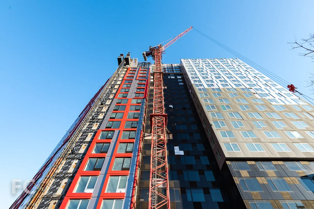 Looking up at the south facade from Dean Street.
