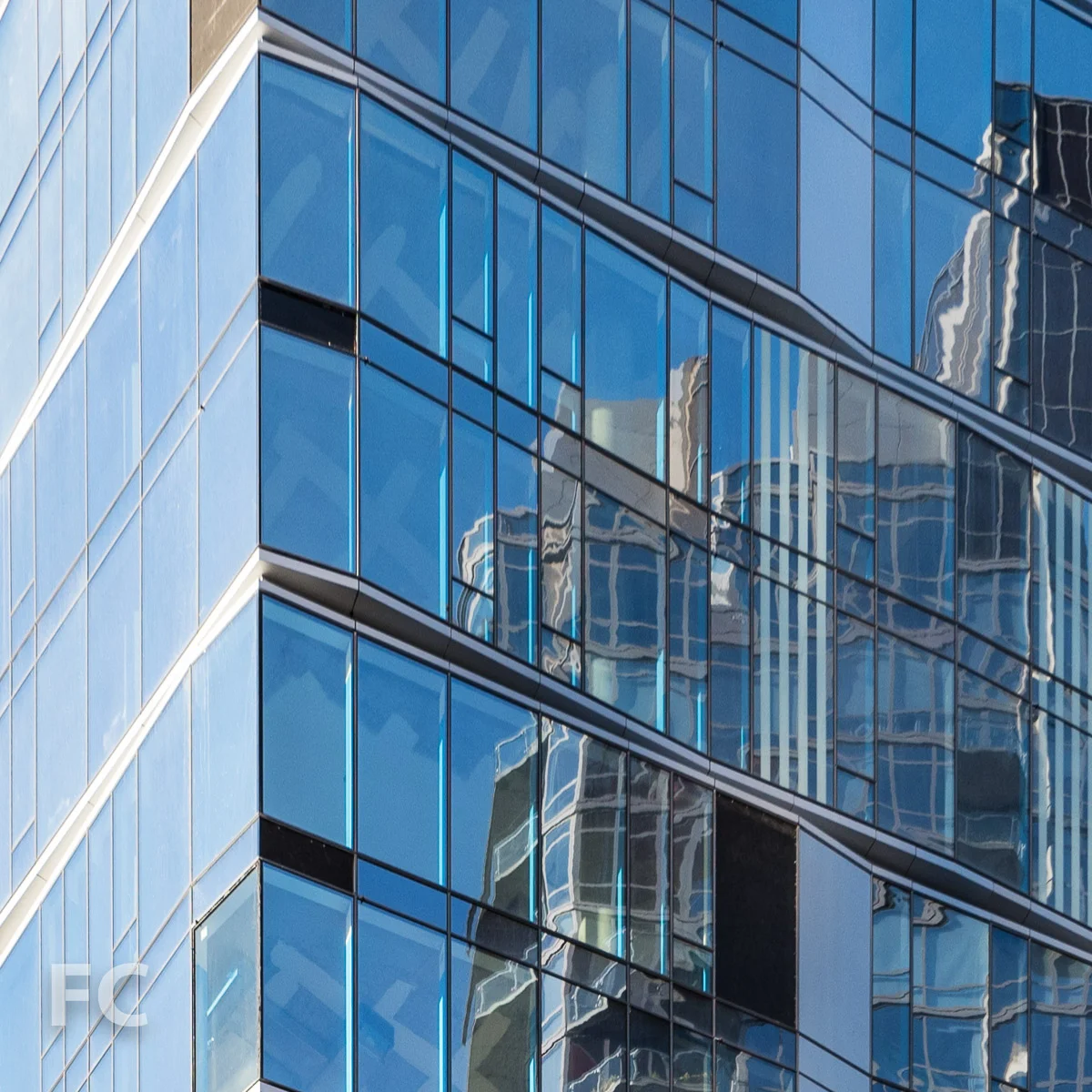 Close-up of the glass curtain wall.