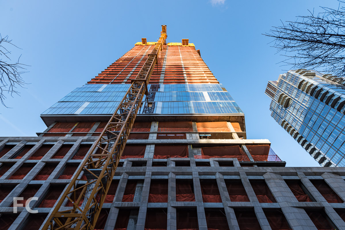 Looking up at the south facade from West 59th Street.
