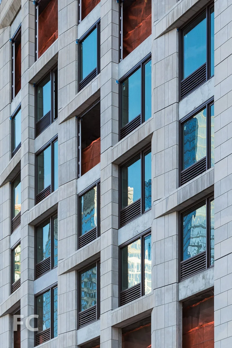 Close-up of the west facade of the podium.