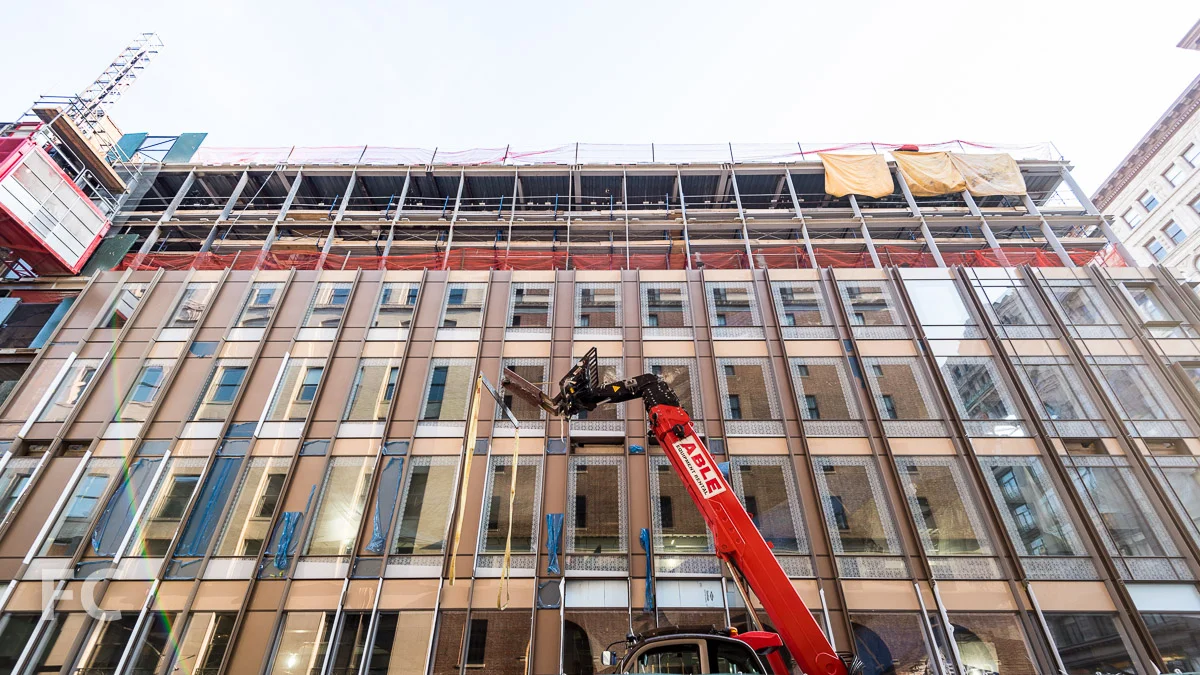 Looking up at the south facade from Spring Street.