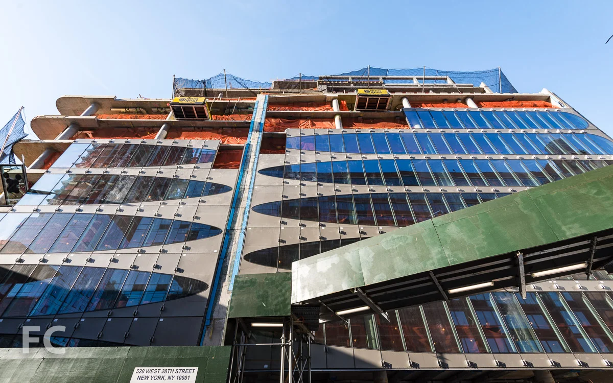 Looking up at the north facade from West 28th Street.