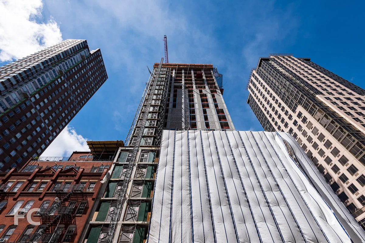 Looking up at the east facade from First Avenue.