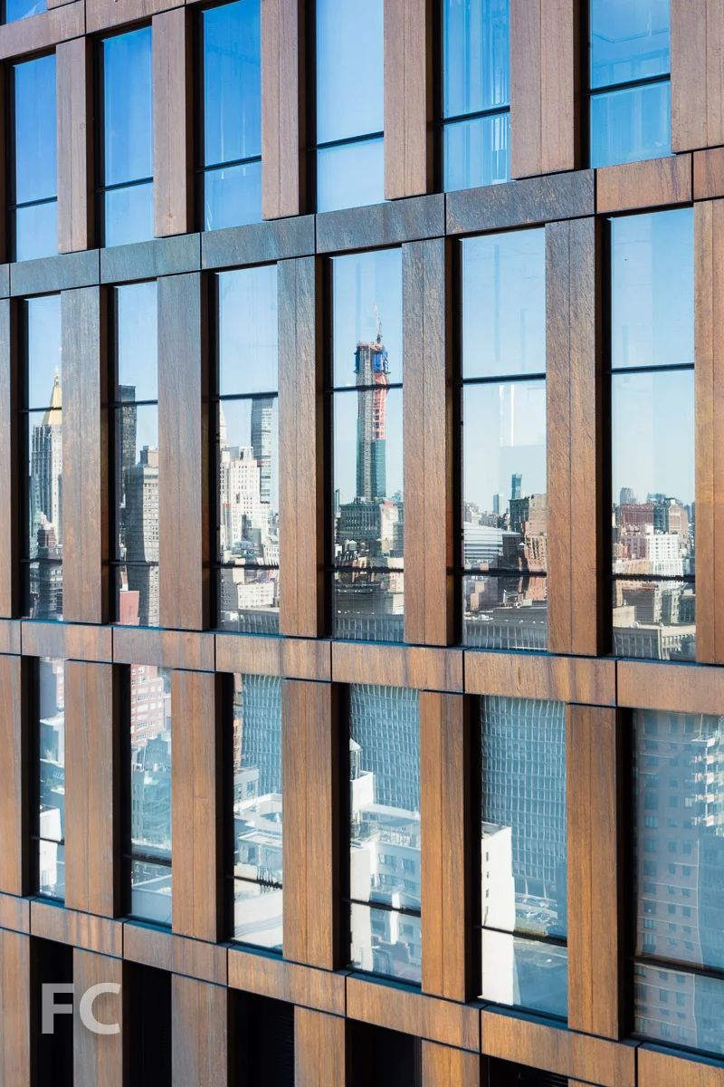 Close-up of the south copper and glass facade.