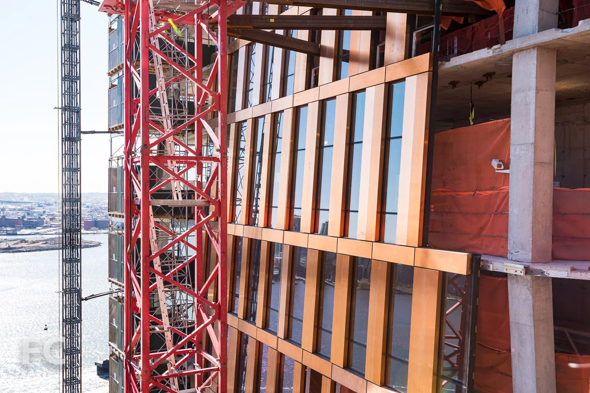 Close-up of the copper and glass north facade.