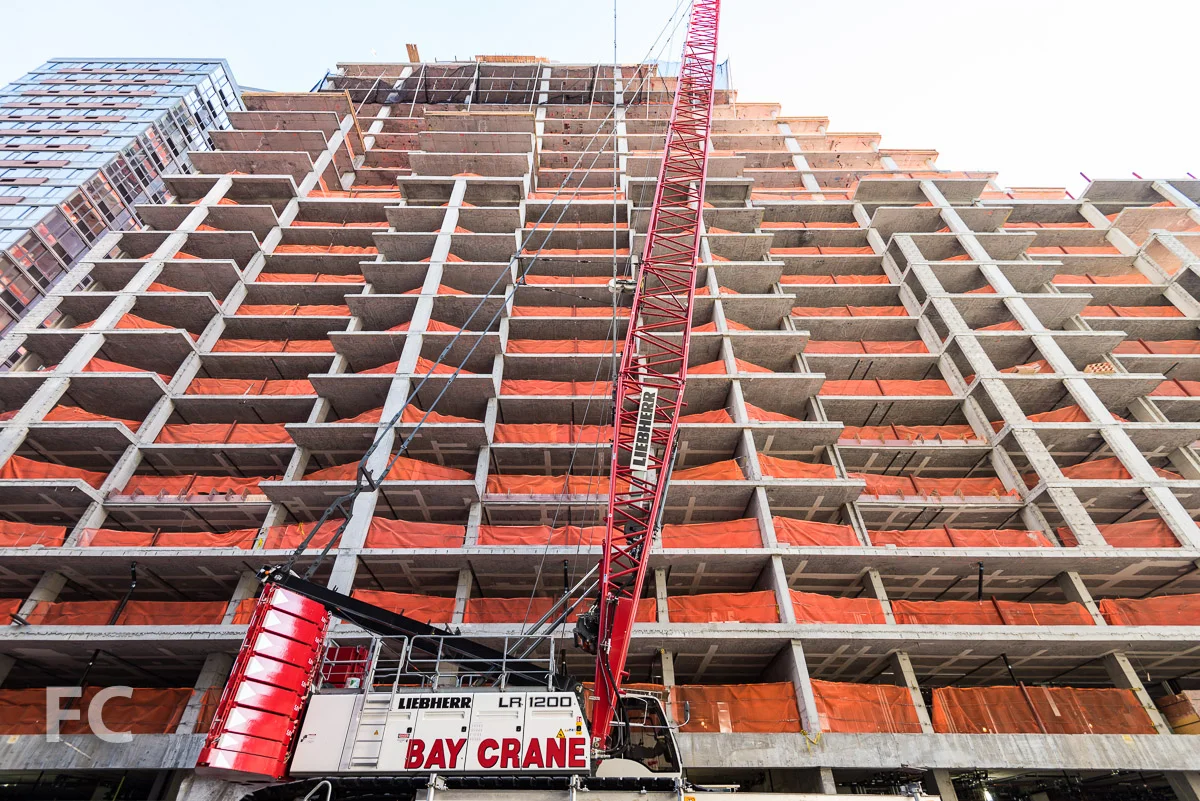 Looking up at the north facade at the West 53rd Street tower.