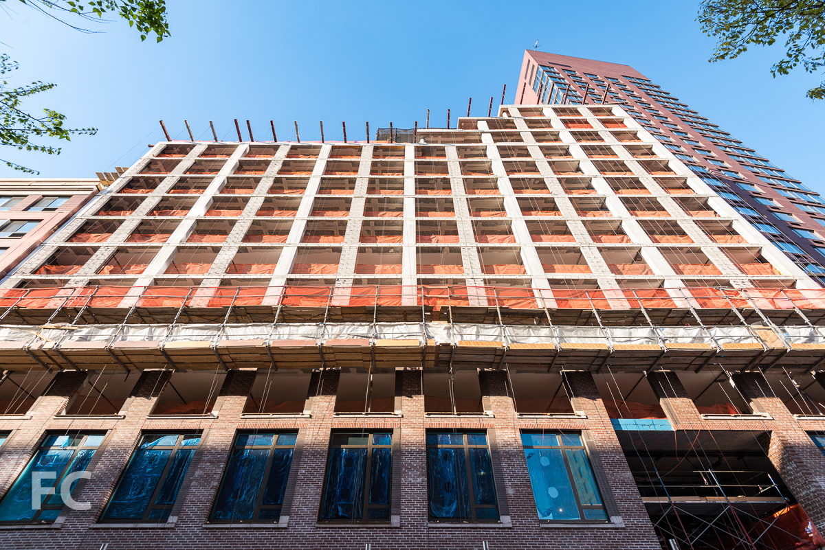Looking up at the south facade from West 52nd Street.