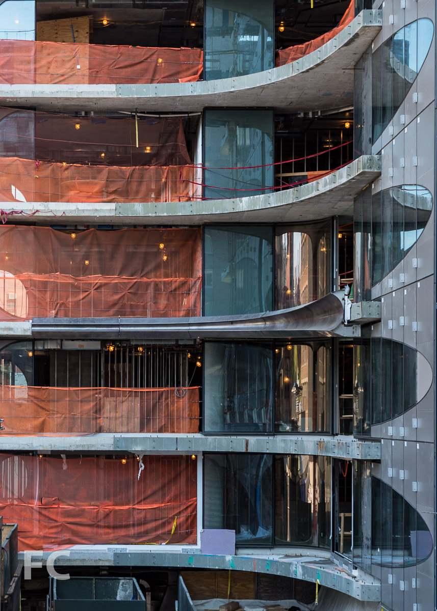 Detail of the metal facade installed at the southeast slab edge.