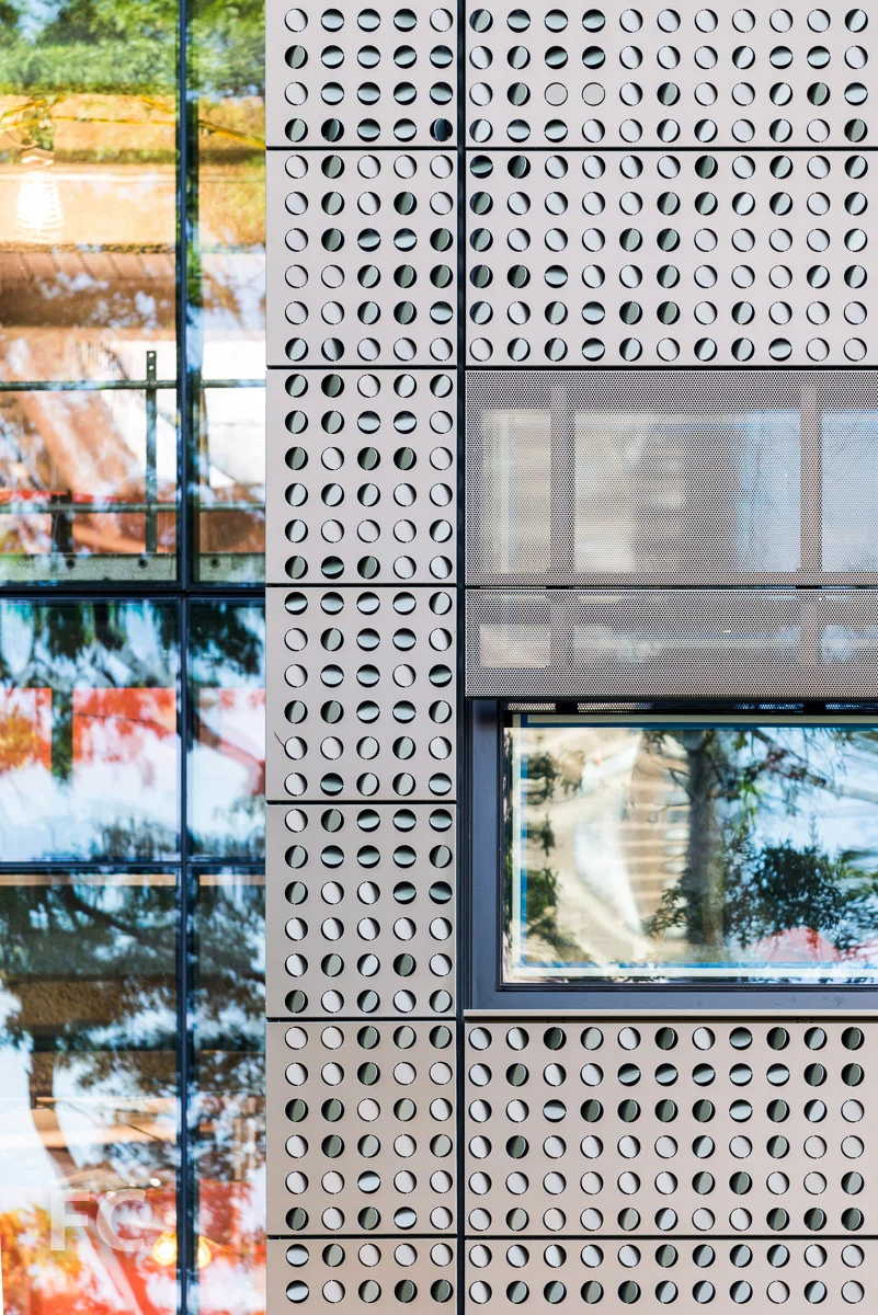 Close-up of the west façade of the Bloomberg Center.