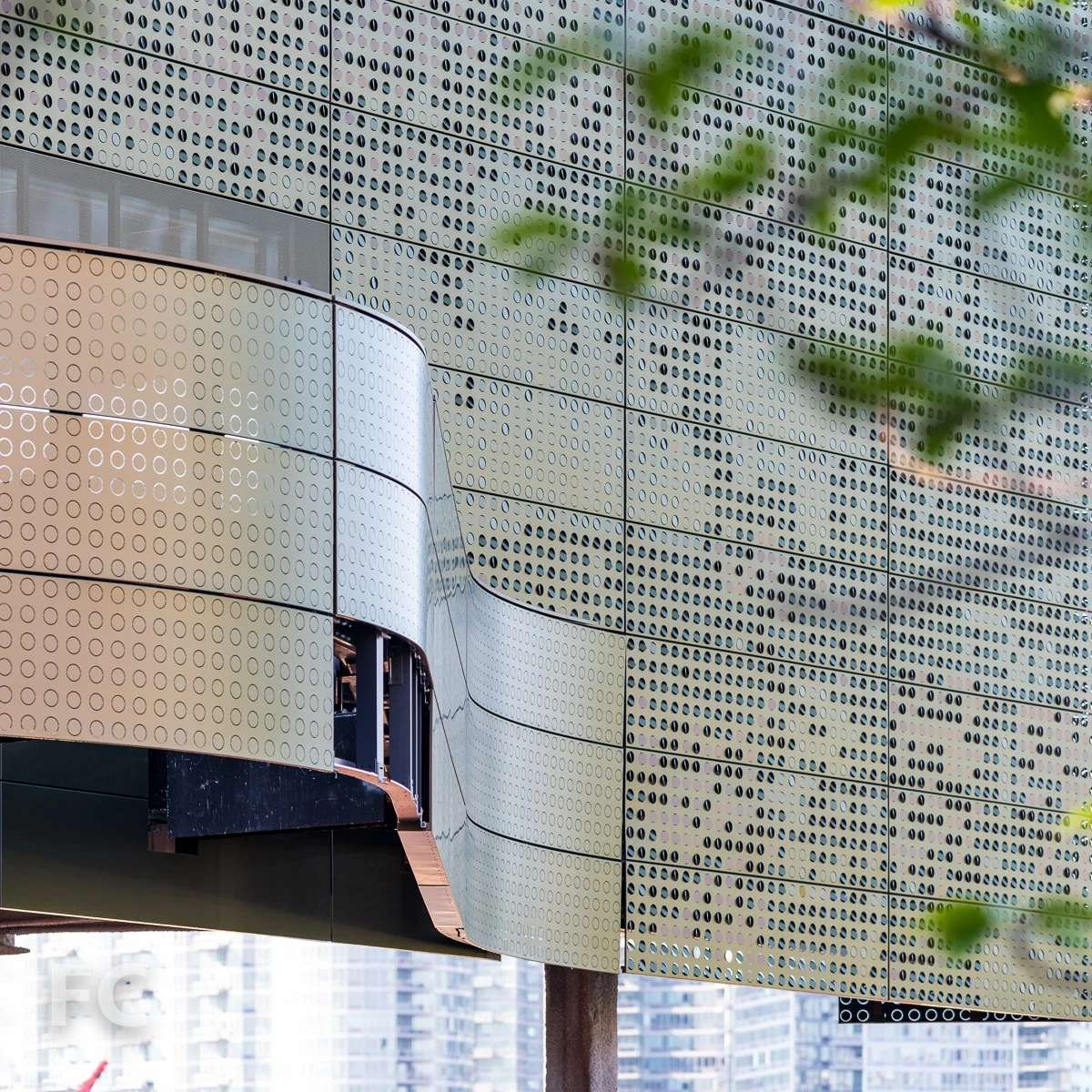 Close-up of the west façade and canopy of the Bloomberg Center.