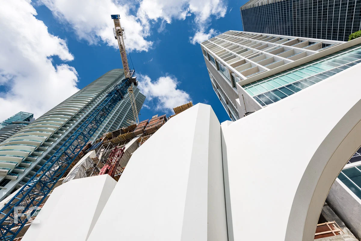 looking up at the GFRC facade mock-up and the tower rising beyond.