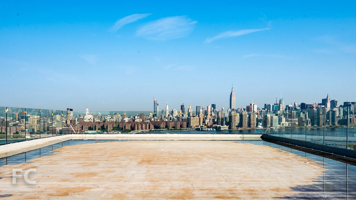 Panoramic view of Manhattan from the rooftop event space under construction.