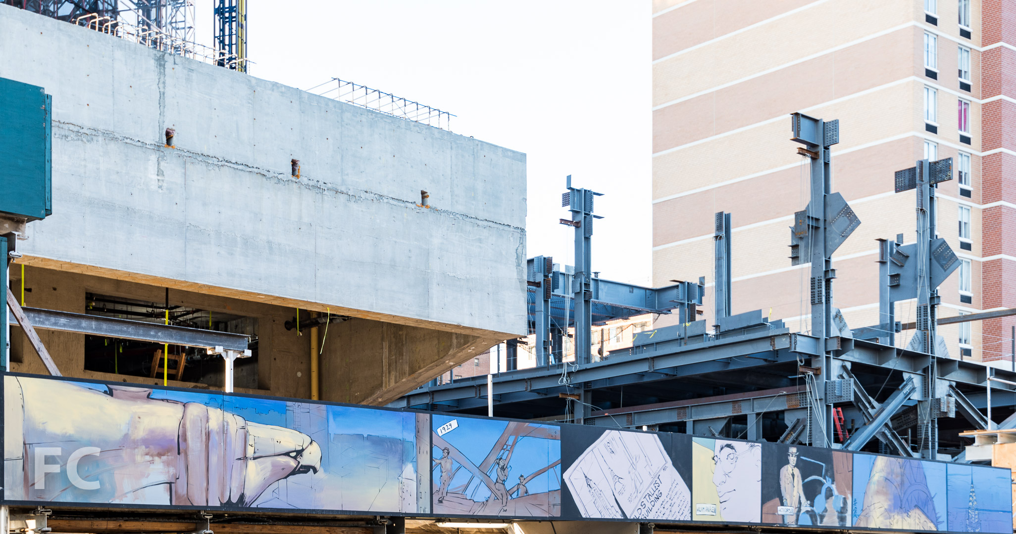 Construction shed artwork along South Street.