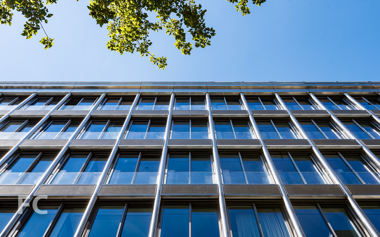 Looking up at the east facade from Crosby Street.