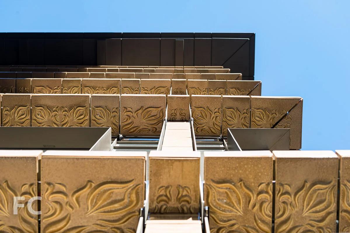 Looking up at the southeast corner of the facade.