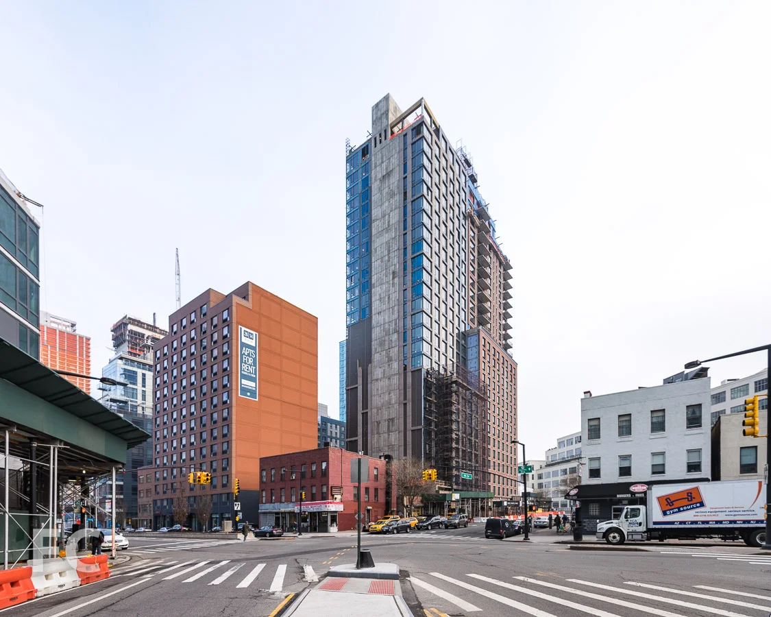 Northwest corner of the block with Watermark Court Square (right) and The Edison (far right).