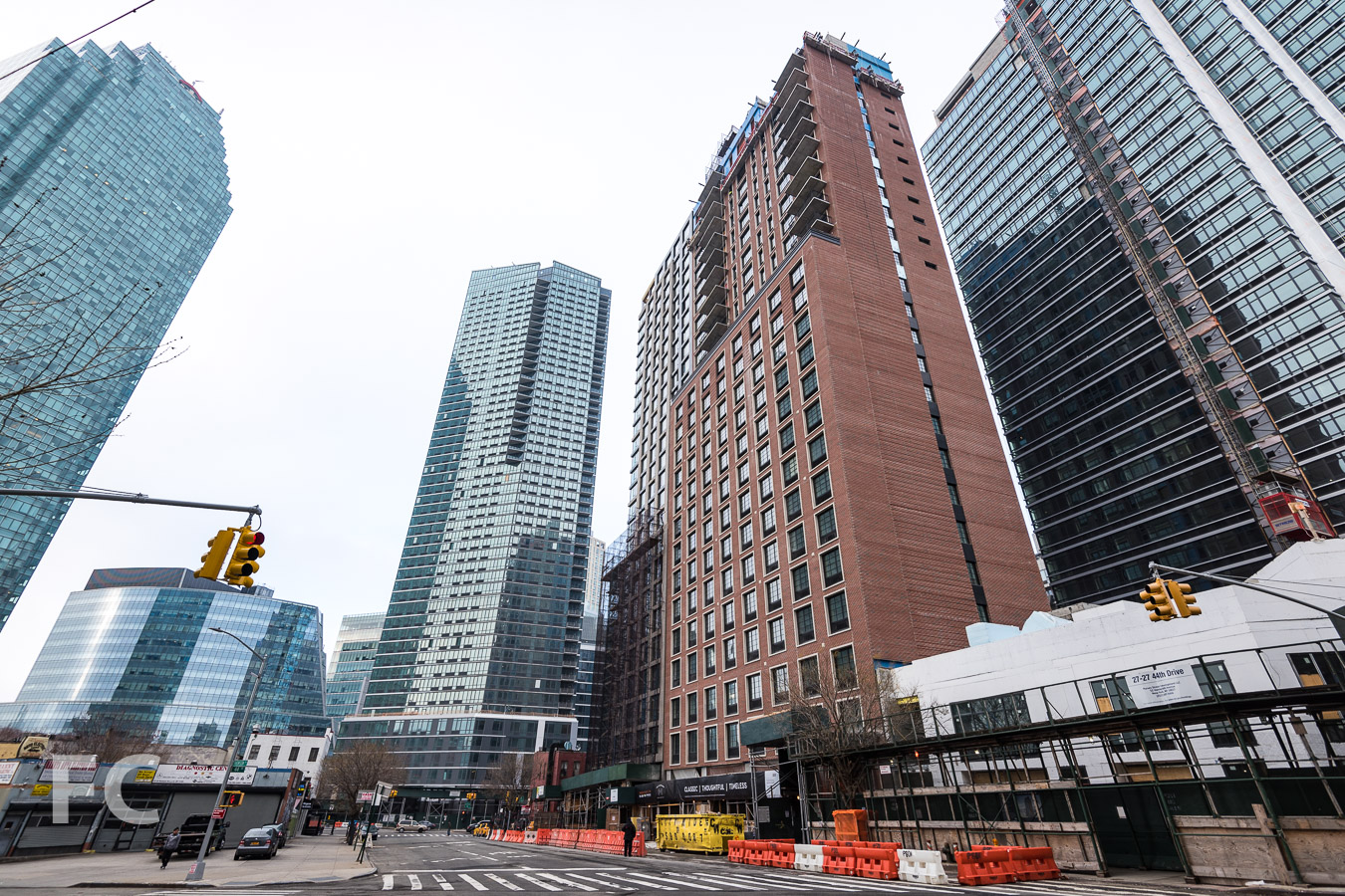 Looking north from the intersection of 44th Drive and Thomson Avenue with The Hayden (left), Watermark Court Square (center), The Edison (right), and 44-28 Purves Street (far right).