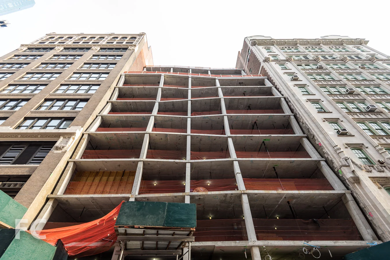 Looking up at the south facade from East 22nd Street.